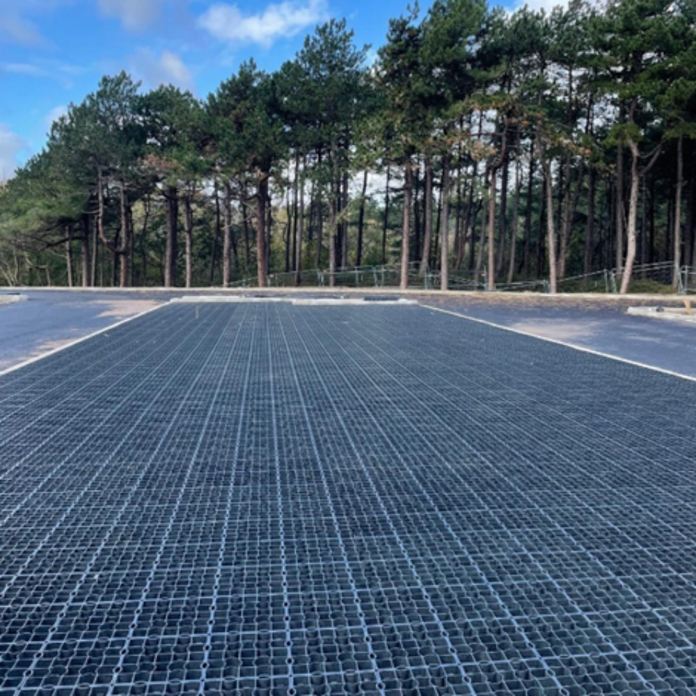 EcoGrid permeable paving installed at Formby Beach car park, providing a sustainable, free-draining parking surface that protects the surrounding woodland and coastal environment